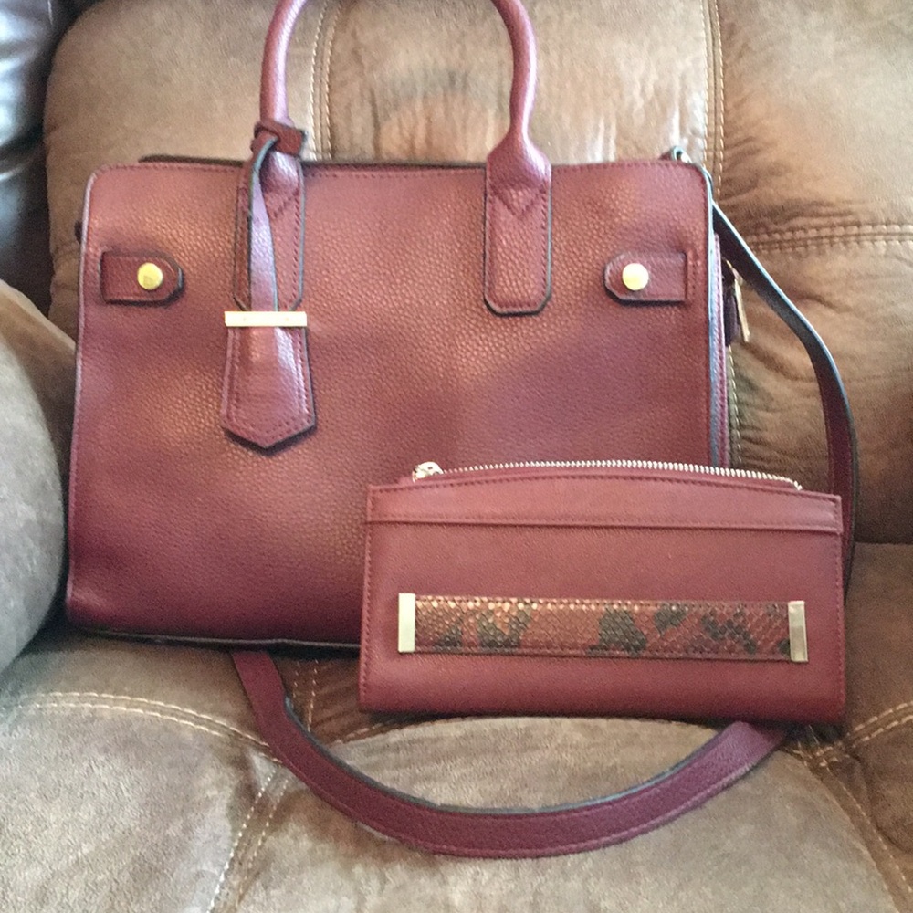 Maroon leather purse with matching billfold